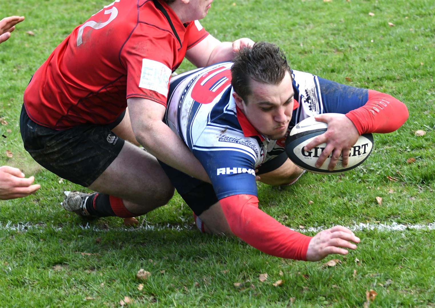Moray player coach Cameron Hughes powers over for his team's third try. Picture: James Officer