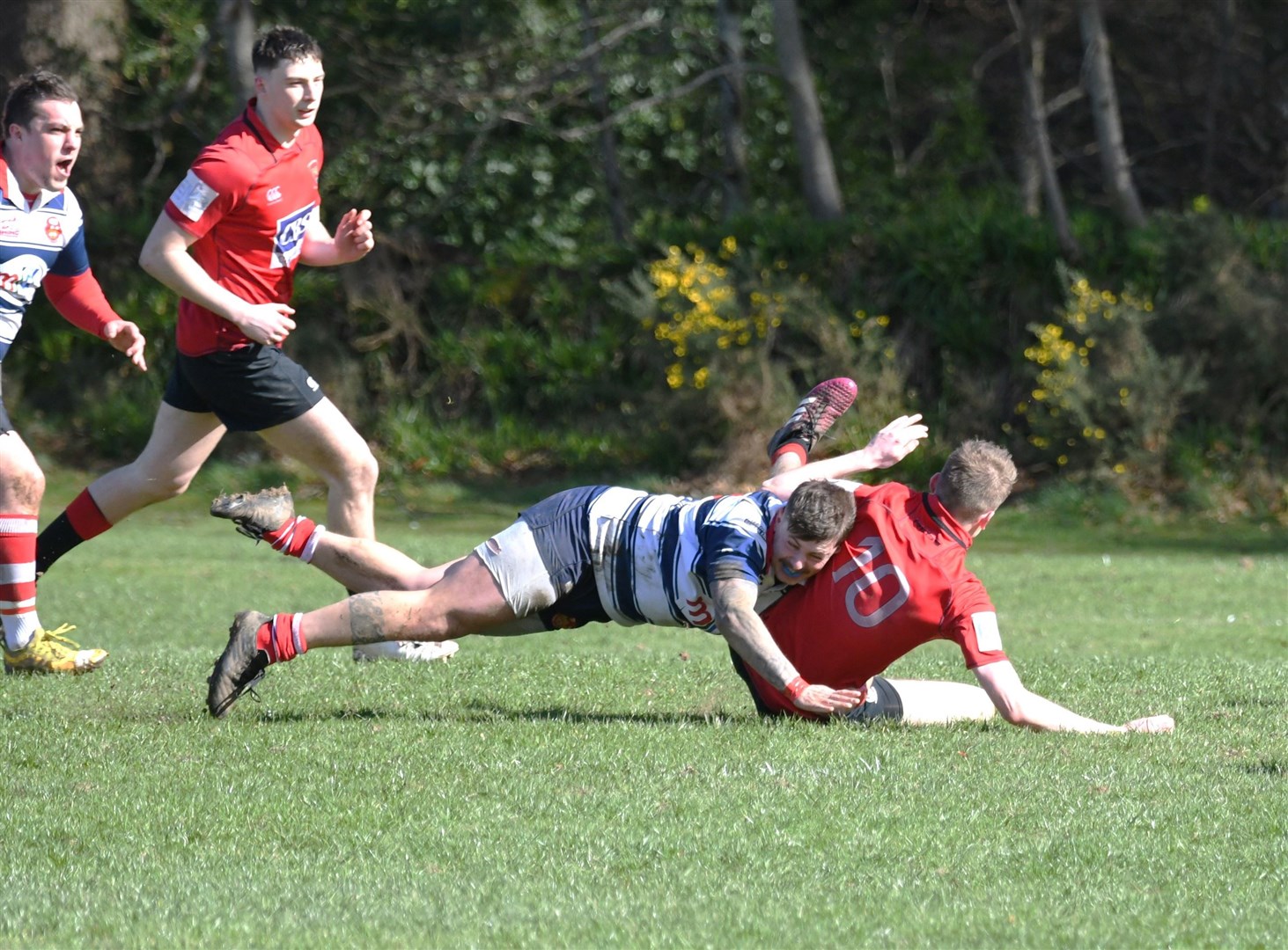 Connor McWilliam tackles the opposing stand-off. Picture: James Officer